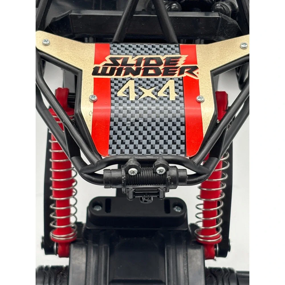 New Bright Slide Winder 4x4 RC Monster Truck Black Red Gold Roll Cage Toy